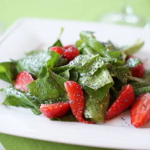 Photo of spinach salad with strawberries from Marko Rick from Pexels