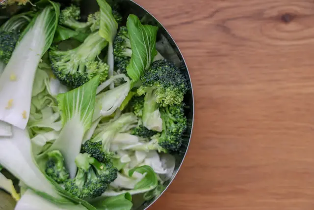 Photo of chopped bok choy and broccoli from Mor Shani from Unsplash