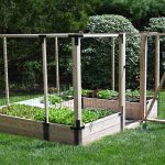 Photo of a square raised bed garden with deer-resistant panel fencing
