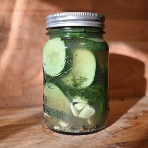 Pickled cucumbers in a glass jar