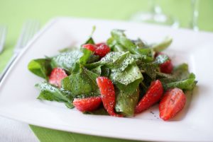 Photo of spinach salad with strawberries from Marko Rick from Pexels