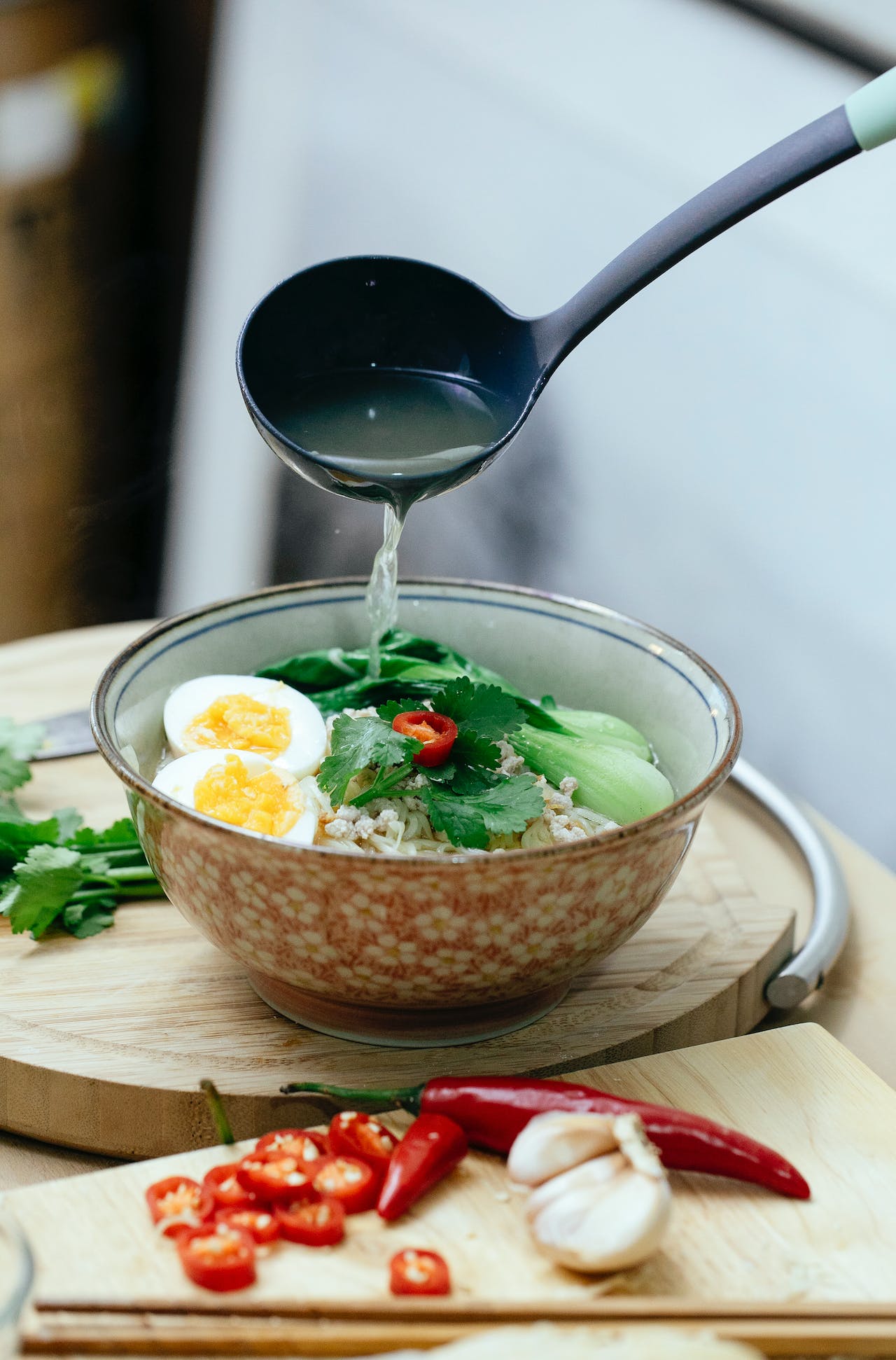 Photo of ramen soup with bok choy from Katerina Holmes from Unsplash