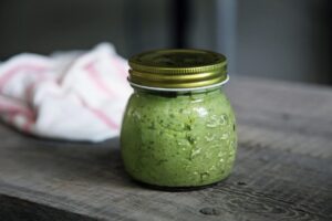 Photo of pesto in a glass jay from Caroline Attwood from Unsplash