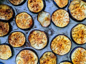 Photo of sliced and roasted eggplant from Lucian Alexe from Unplash