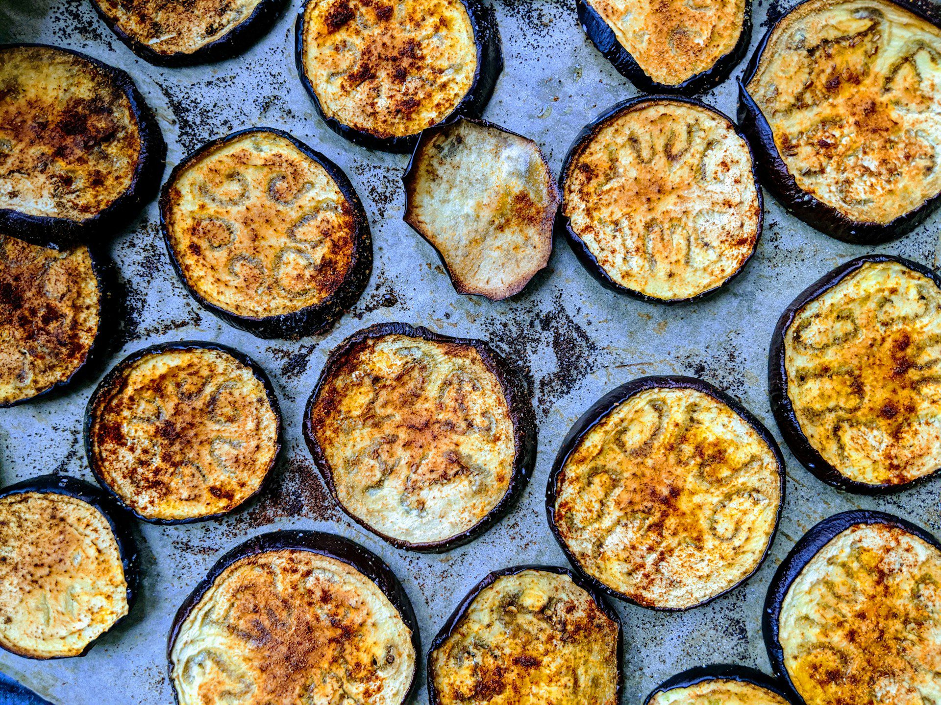 Photo of sliced and roasted eggplant from Lucian Alexe from Unplash
