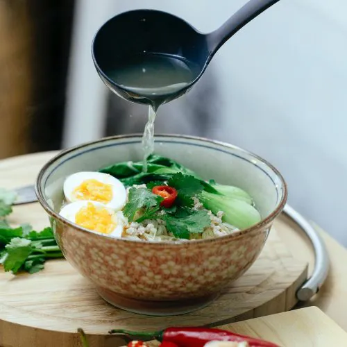 Photo of ramen soup with bok choy from Katerina Holmes from Unsplash
